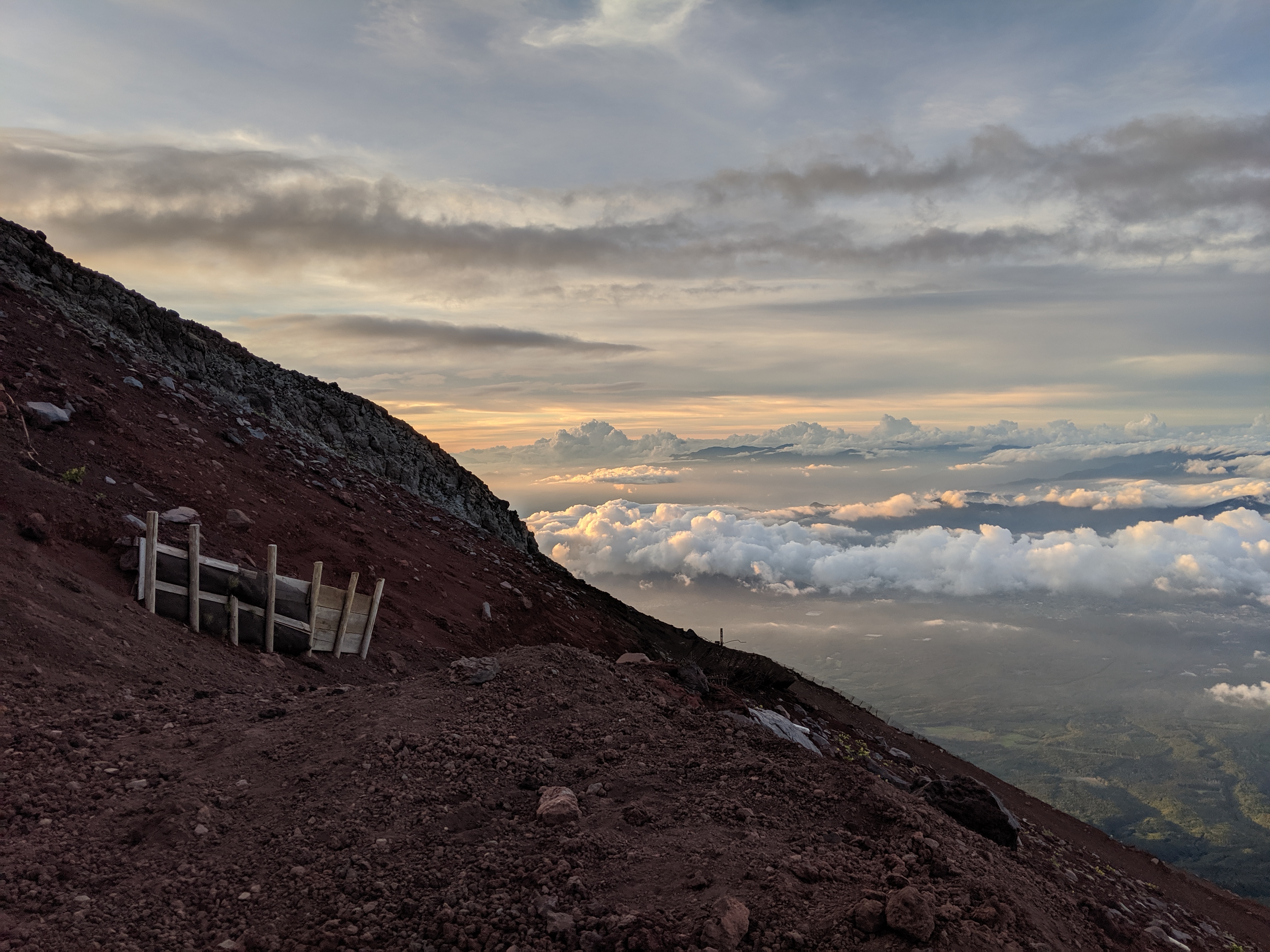 The horizon disappears into the clouds.